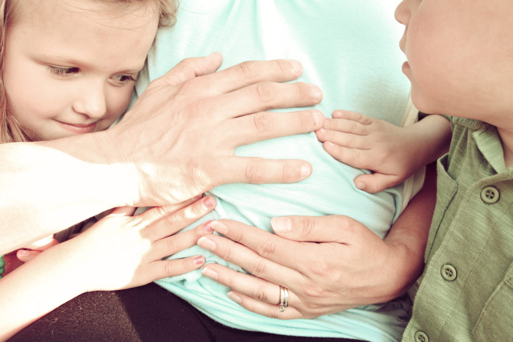 Hands on Pregnant Belly
